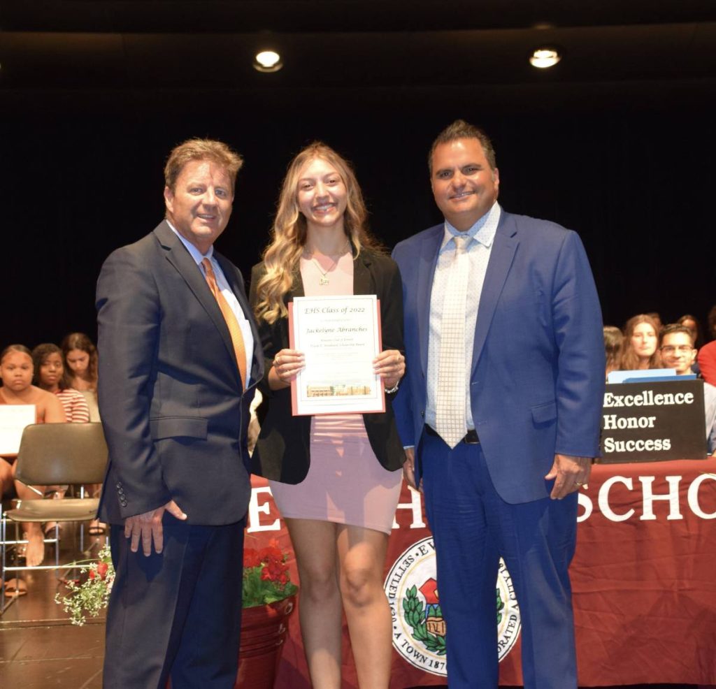 Mayor Carlo DeMaria and Assistant Superintendent of Operations Charles Obremski alongside Jackelyne Dutra Abranches, who received the Kiwanis Club of Everett Frank E. Woodward Scholarship.