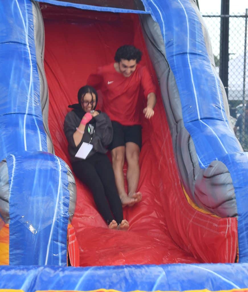 Sliding down the inflatable water slide