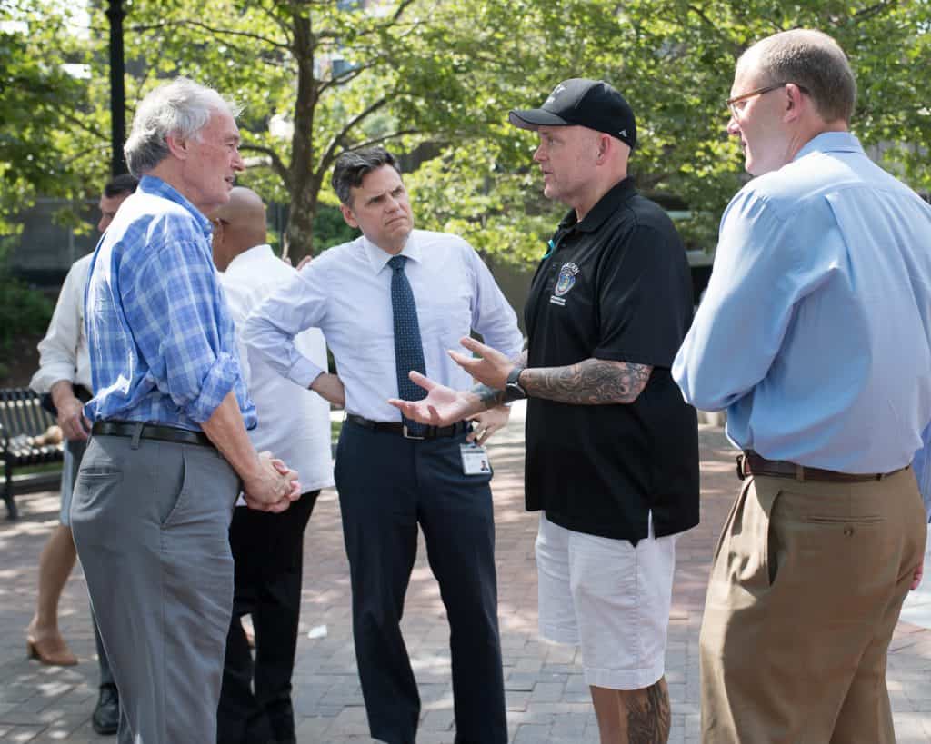 Addiction Recovery Resource Specialist Paul Hammersley explains the Malden Cares program to U.S. Senator Ed Markey along with Mayor Gary Christenson and State Senator Jason Lewis-2