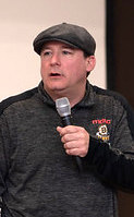 Comedian Dave Russo performing