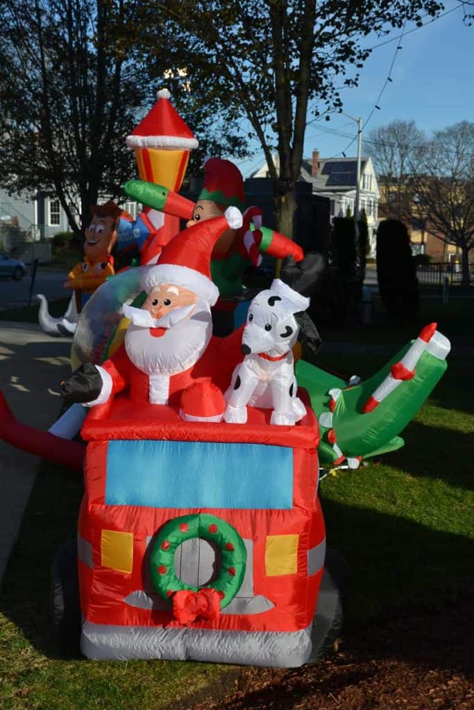 A blow up of Santa driving a fire truck-2