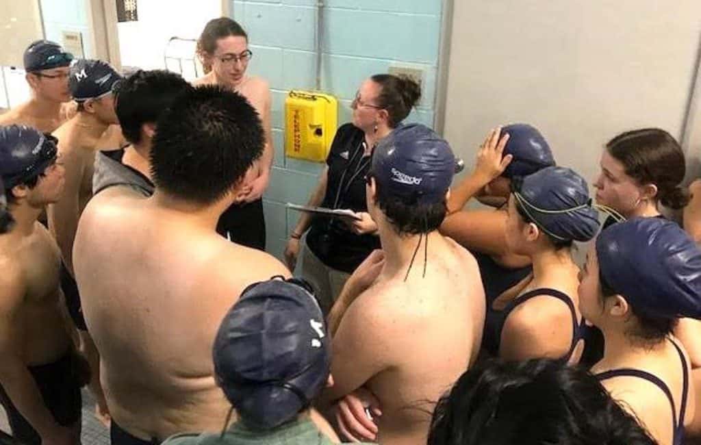 Coach Jess Bisson talks to the Tornado team before the meet-2
