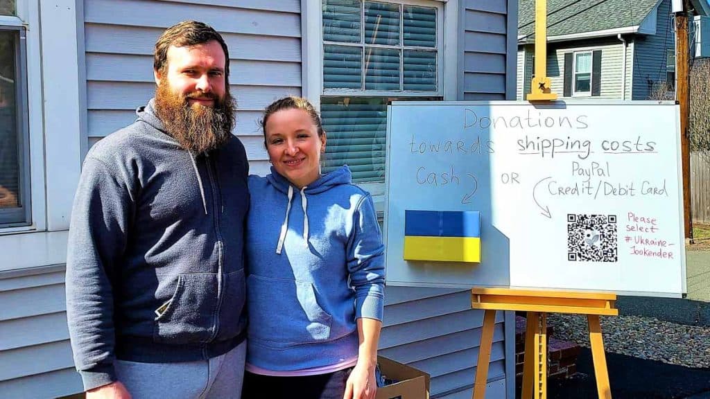 FROM SAUGUS WITH LOVE Dimitry and Lana Sevkovich stand in front of their Baker Street home last Saturday (April 2) during the donation drive they organized for the people of Ukraine