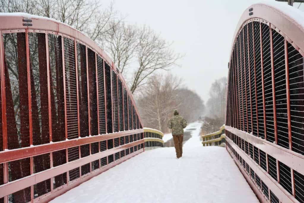 BIKERS AND HIKERS WELCOME Snow falling all day Sunday gave the new bridge on the bike trail a coating of white-2