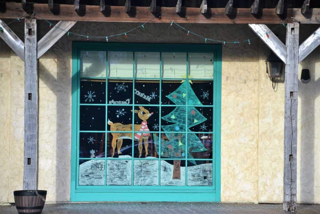 DEER ART This fanciful view of a fawn (maybe Rudolph) painted on the windows of Border Cafe on Route 1 is one of many holiday scenes featuring deer that can be seen around town-2