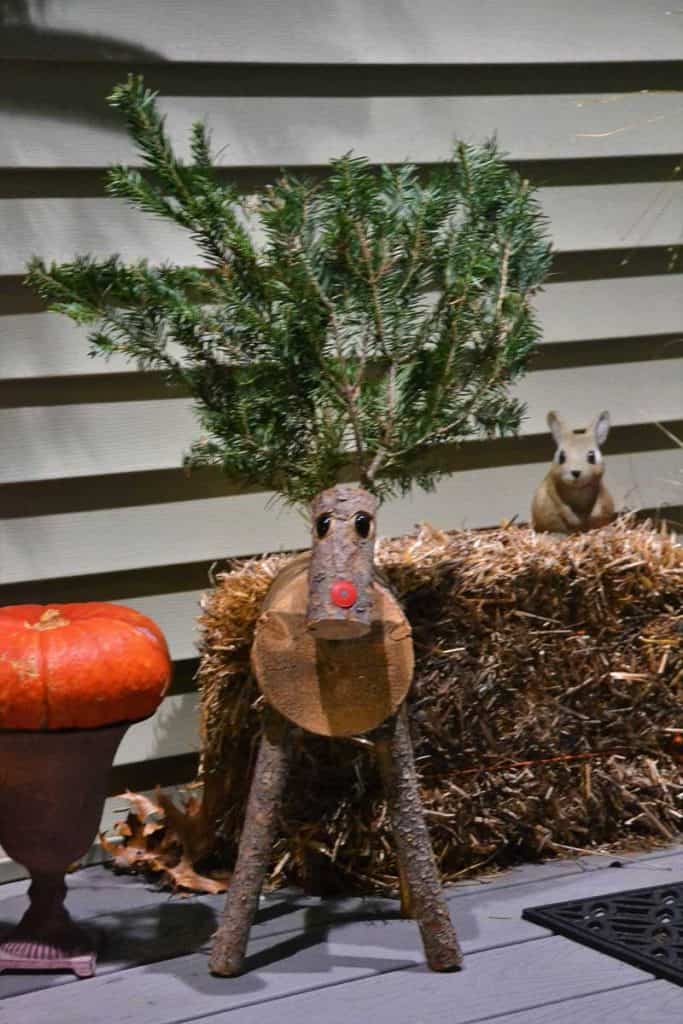 CHRISTMAS CHARM This log deer from Little Brook Florist and Garden Center has a lot of personality-2