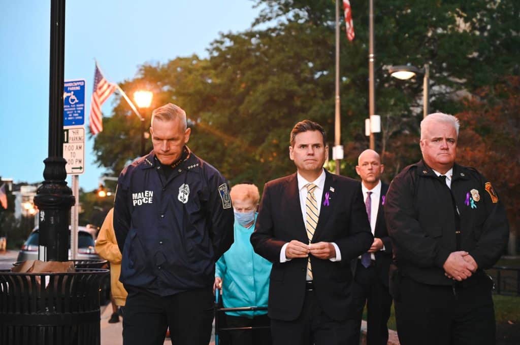 Mayor Christenson, Police Chief Molis. Fire Chief Sullivan lead the march at MOA_s 6th Annual Candlelight Vigil_