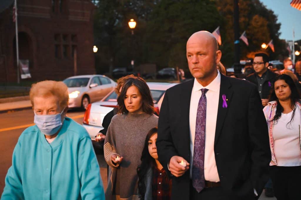 President of MOA Paul Hammersley along with his daughter Bella wife Lisa and his mom march during the vigil_-2