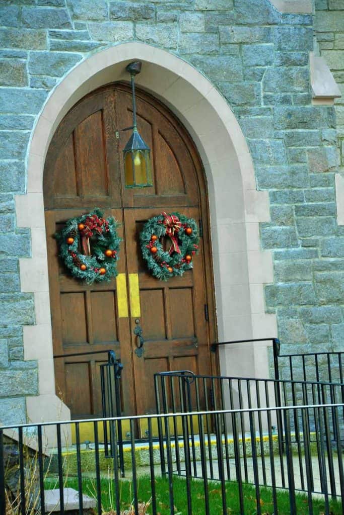 WREATHS ON THE DOORS of Cliftondale Congregational Church herald the Christmas season-2