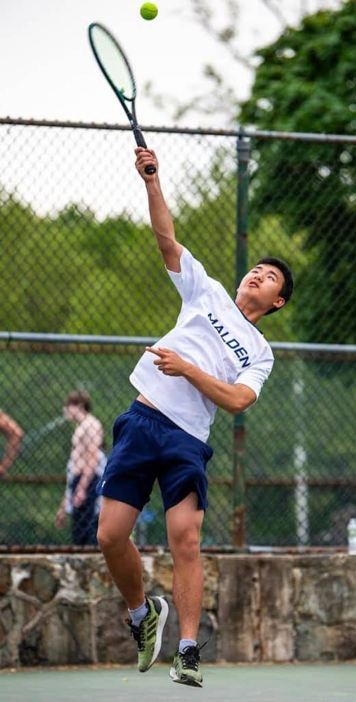 Wilson Jiang with a powerful serve