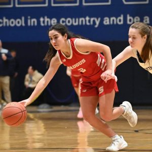 Senior Madison Botta dribbled the ball past a Winthrop defender in recent action. (Advocate file photos by Emily Harney)