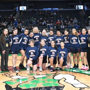 1.	The RHS Patriots Varsity girls’ basketball team are shown at half court at the TD Garden before their game at the annual Andrew James Lawson Foundation 2024 Invitational.
