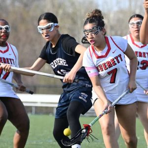 Amanda Verteiro with the ball as Revere defenders close in during a recent GBL matchup.  (Advocate photo by Emily Harney)