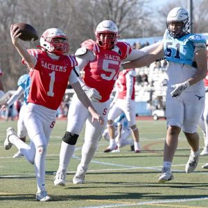 Senior Chris Mazin ran in a touchdown for the Sachems during Thursday’s Thanksgiving Day game.