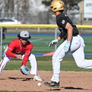 The Pats’ Sergio Peguero fields a ground ball as a Classical baserunner heads to second.