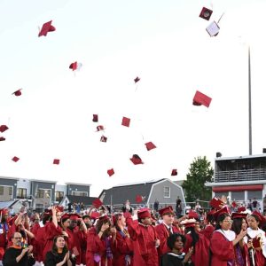 The EHS Class of 2026 celebrate by tossing their caps!