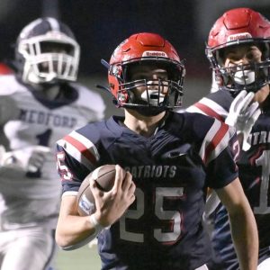 Revere’s Reda Atoui scored a touchdown for the Pats with three minutes to go in the fourth quarter, tying the game 14-14.  (Advocate photo by Emily Harney)