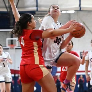 Revere Senior Belma Velic looks to the basket during Tuesday night’s action against Everett.  (Advocate Photo by Emily Harney)