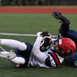 Pats’ two-way player Ahmed Bellemsiel had a great game against Lynn Classical. Here he is shown making a great catch against Medford in previous action. (Advocate file photo/Emily Harney)
