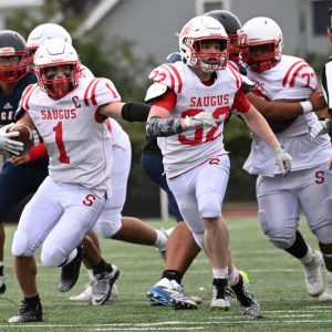 Sachems Capt. Tommy DeSimone is shown on the carry for Saugus in recent action against Lynn Tech. (Advocate file photo)