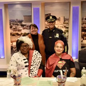 Bottom row: Director of Diversity, Equity, and Inclusion Cathy Draine and DEI Officer Simone Holyfield. Top row: Director of Portal To Hope Deb Fallon and Police Chief Paul Strong.