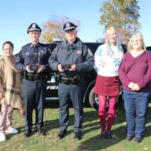Shown from left to right: Horses and Heroes Foundation volunteer Sherry Rose, Detective John Ryan, Detective Chris Grace, Horses and Heroes Foundation President Skyllar Mulvaney and friend Lola Rex with their awards.
