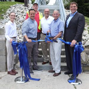 Acting Mayor Patrick Keefe and Ward 2 City Councillor Ira Novoselsky officially cut the ribbon opening the newly renovated public access stairway, which leads from Campbell Avenue to Florence Avenue. Joining them are State Representative Jeff Turco, Northeast Metro Tech School Committee Member Anthony Caggiano, Revere Chamber of Commerce Executive Director Erica Porzio and City of Revere Construction Oversite Manager Bill Guinasso.