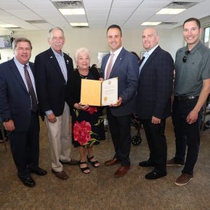 Acting Mayor Patrick Keefe presented Roxanne Aiello, who is president of the Tenants Association, a citation from the City. Shown in the photo are Jack Satter House Executive Director Stephen Post, Ward 2 City Councillor Ira Novoselsky, Councillor-at-Large Marc Silvestri and Candidate for Mayor/Councillor-at-Large Steven Morabito.