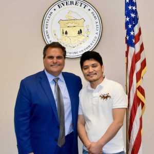 Mayor Carlo DeMaria (left) congratulated Manoj Pun Magar (right) on his recent purchase of his first home in Everett with help from the City of Everett’s First-Time Homebuyer Down Payment Assistance Program.
