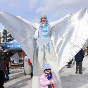 TWO ANGELS: Persephonie Diaz, 5, with Gina DeFreitas, who was dressed as the Snow Queen during last Saturday’s Second Annual Winter Wonderland on Revere Beach.