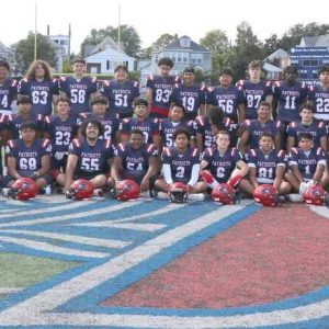 The 2025 Revere High School Varsity Football Patriots Team: Shown in no particular order: Mario Ramirez, Sergio Peguero, Jose Fuentes, Jackson Martel, Anthony Pelatere, Bryan Fuentes, Marcelo Fermin-Cuartas, Joseph Angiulo, Charles Dobre, Arthur Nazareth, Reda Atoui, Eric Sea, Emanuel Alejo, Gustavo Correia, Ismael Romero-Gonzalez, David Cruz, Audi Kuy, Filipe DeMelo, Jason Rivera, Erick Mathiu, Sean Campos, Didier Arce, Amari Miller-Tobey, Yassine Merzaq, Emerson Baires, Yahir Chocoj, Rothanak Huot, Kouwen Kuy, Walter Franklin, Silvio Neto, Pablo Morisita, Christopher D’Angelo, Diego Leal Robles, Julian Deida, Mikhai Pyran, Michael Casarano, Amir Mustedanagic, Ceaser Herrera, Omar Espinoza, David Portillo, Dio Mendoza, Louis Forte, Benjamin Santos, Valentin Vicente, Nabil Aitvouzidi, Thomas Waldron, Adalberto Martinez and Bryan Maia with Head Coach Louis Cicatelli and Assistant Coaches Vincent Gregorio, Brandon Brito, Jared Gordinas and Edward Doris.
