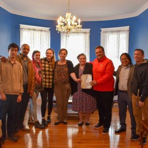 Mayor Carlo DeMaria presented a Citation to New Chapter Living Recovery Homes congratulating them on their recent opening of a new home in Everett. From left: Operations Assistant Sky Karyadi, Managing Partner of Operations Mitesh Rai, Malden residents Tiffany Spillane and Olivia Snyder, Director of Resident Care & Community Partners Joelle Dawson, Stoneham resident Lori Briere, Mayor Carlo DeMaria, Realtor Anto Sianturi and City of Everett Substance Abuse Services Coordinator Chris Simonelli.
