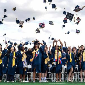 CAP TOSSING: The members of the Malden High Class of 2025 celebrate graduation with the traditional “cap toss” at the end of the ceremony. (All Advocate Graduation Photos by Henry Huang)