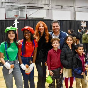 Mayor Carlo DeMaria and First Lady Stacy DeMaria alongside attendees.