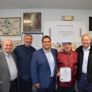 Ottavio’s Barber Shop owner Ottavio Lograsso was presented a citation by Mayor Carlo DeMaria on behalf of the City of Everett congratulating him on 25 years in business.