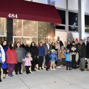 The Everett community gathered in front of Everett City Hall to light the menorah on the first night of Hanukkah.