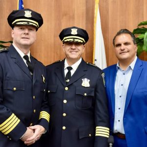 Police Chief Paul Strong (center) is shown with Mayor Carlo DeMaria and former Police Chief Steven Mazzie during the June swearing-in ceremony at City Hall. (Advocate file photo)