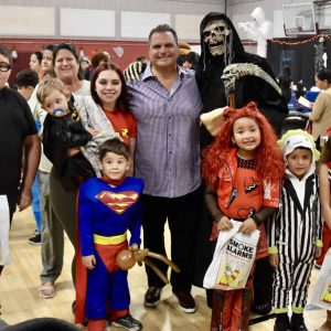 Mayor Carlo DeMaria is joined alongside attendees at the city’s annual Halloween Bash at the rec center.  (Photo courtesy of the City of Everett)