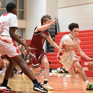 Sachems Ryan Shea drove the ball past a Gloucester player during recent action.