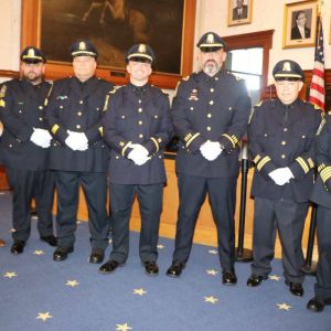 Shown from left to right: Mayor Patrick Keefe, Sgt. Joseph Singer, Sgt. Greg Tammaro, Lt. Dennis Hickey, Lt. Joseph Turner, Captain Brian Chapman and Police Chief Maria LaVita.