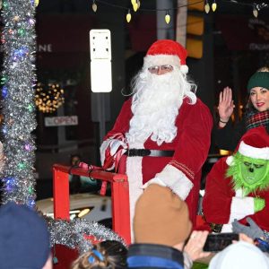 1.	Onlookers greet Santa and the Grinch who is escorting Mayor Patrick M. Keefe Jr. and First Lady Jennifer, for Revere’s annual Santa Parade and Tree Lighting. The Parade is held in honor of the late Priscilla Nickerson and the Priscilla Nickerson Memorial Scholarship Fund.