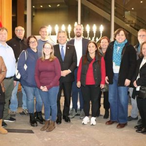 Shown from left to right: Back row: Ward 6 School Committee Member-Elect Peter Piazza, Ward 7 School Committee Member Keith Bernard, Ward 6 Councillor Stephen Winslow, Superintendent Tim Sippel, Mayor Gary Christenson, Rabbi Sruli Baron, Ward 1 Councillor Peg Crowe and Ward 1 School Committee Member Michael Drummey; standing: Councillor-at-Large Karen Colón-Hayes, Ward 5 Councillor Ari Taylor, Ward 3 Councillor Amanda Linehan, Ward 8 Councillor Jadeane Sica, Councillor-at-Large Carey MacDonald, Councillor-at-Large-Elect Michelle Bucci-Luong and Ward 8 School Committee Member Sharyn Rose-Zeiberg.