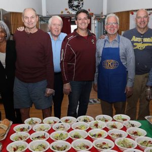 12.	The Everett Kiwanians that help serve dinner last Tuesday evening at the Connolly Center, from left: Darren Costa, Janis Caines, Bernie Schram, John Mackey, President Fred Capone, Lou Morelli, Kathy Dottin, Dave O’Neil and Tom Fiorentino.