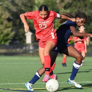 Captain Casey Martinez with the ball for Everett.