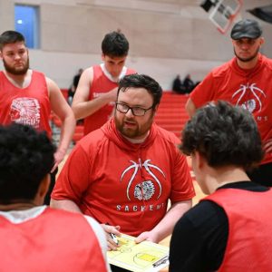 Saugus boys’ basketball coach Joseph Bertrand is shown talking strategy to his team before their scrimmage last week against Revere. (Advocate file photo)