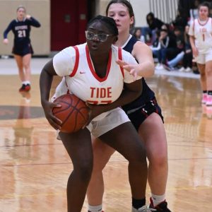 Everett’s Taisha Alexandre looked for a teammate during last year’s game against Revere. (Advocate file photo)