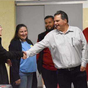 Mayor Carlo DeMaria greets city employees working with the Nan Project.