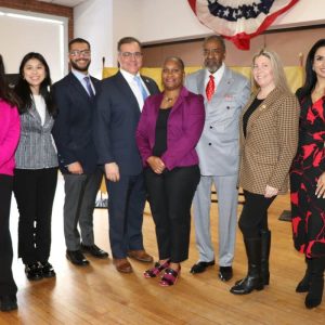 Shown from left to right, are: Ward 1 City Councillor Michelle Capone, Ward 5 City Councillor Vivian Nguyen, Ward 3 City Councillor Anthony DiPierro, Mayor Robert Van Campen, guest speaker Lanita Cullinane, Bishop Robert Brown, Ward 4 City Councillor Holly Garcia, and Ward 2 City Councillor Stephanie Martins.