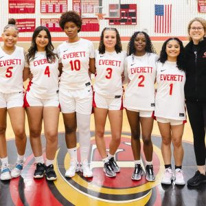 EHS Seniors Geraiah Boyce, Manal Bouhou, Amicha Jacques-Antoine, Emilia Maria-Babcock, Clarice Alexis and Sonia Flores with Coach Riley Dunn.