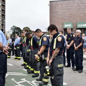 Everett firefighters at the 9/11 Remembrance Ceremony on Monday at the 9/11 Memorial Stone and fountain in Everett Square.